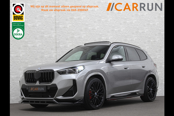 BMW X1 18i M-Sport Performance-Pack | Panorama | Sportstoelen | Carbon | Keyless-Entry | Sfeerverlichting | Achteruitrij-Camera | 5x op voorraad | Carplay | Full-LED | Black-Optic | Getint Glas | Stoelverwarming | Draadloos Laden |