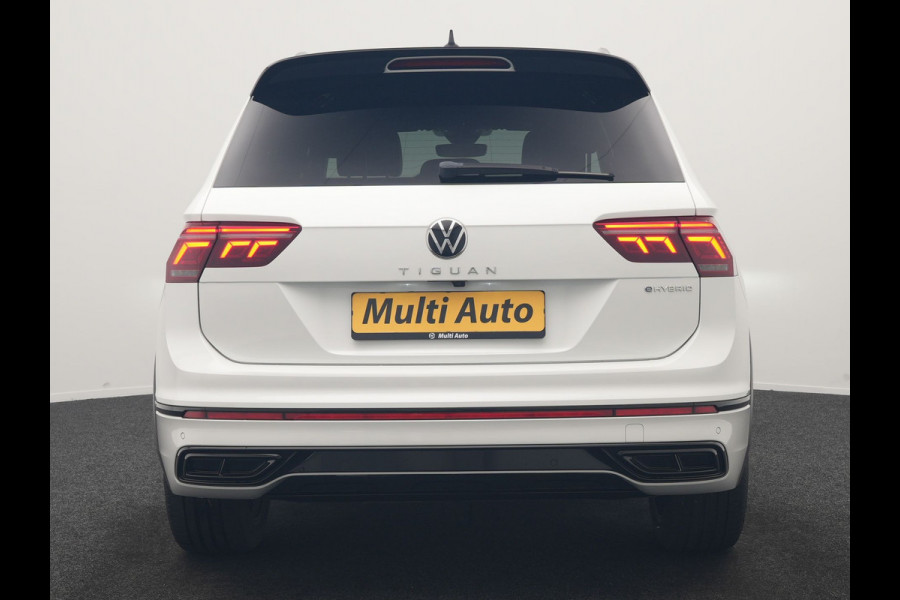 Volkswagen Tiguan 1.4 TSI eHybrid R-Line PHEV 245pk Dealer O.H | Adaptive Cruise | Head Up | Camera | IQ Light | Sportstoelen Verwarmd | Apple Carplay | Keyless | BLIS | Navigatie | Virtual | DAB | 19"L.M | Plug In Hybrid |