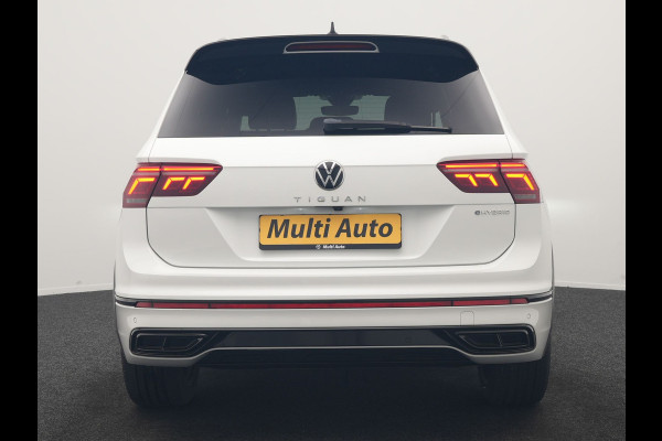 Volkswagen Tiguan 1.4 TSI eHybrid R-Line PHEV 245pk Dealer O.H | Adaptive Cruise | Head Up | Camera | IQ Light | Sportstoelen Verwarmd | Apple Carplay | Keyless | BLIS | Navigatie | Virtual | DAB | 19"L.M | Plug In Hybrid |