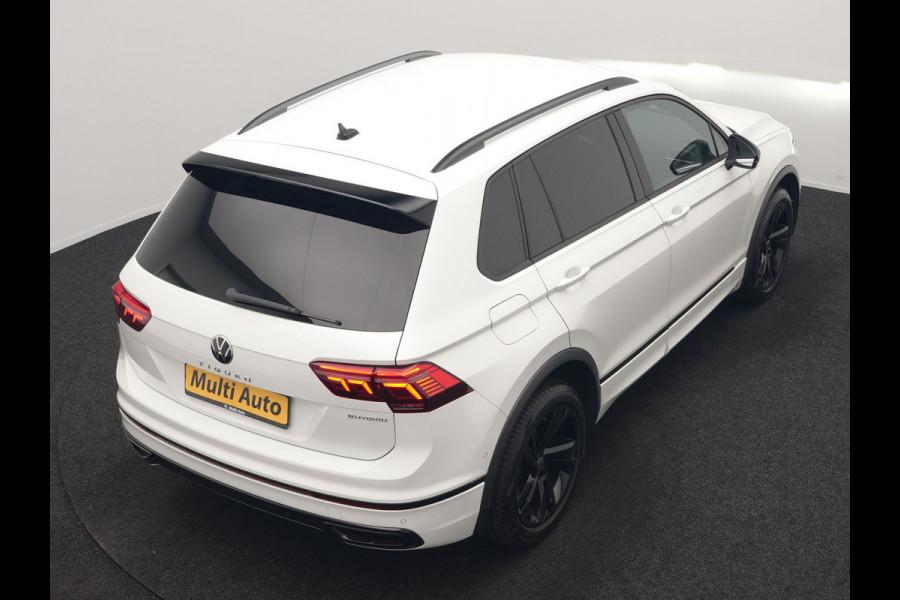 Volkswagen Tiguan 1.4 TSI eHybrid R-Line PHEV 245pk Dealer O.H | Adaptive Cruise | Head Up | Camera | IQ Light | Sportstoelen Verwarmd | Apple Carplay | Keyless | BLIS | Navigatie | Virtual | DAB | 19"L.M | Plug In Hybrid |