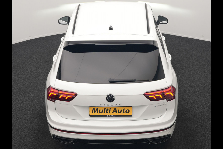 Volkswagen Tiguan 1.4 TSI eHybrid R-Line PHEV 245pk Dealer O.H | Adaptive Cruise | Head Up | Camera | IQ Light | Sportstoelen Verwarmd | Apple Carplay | Keyless | BLIS | Navigatie | Virtual | DAB | 19"L.M | Plug In Hybrid |