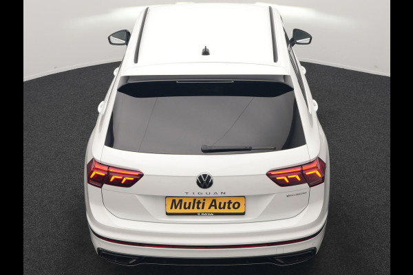 Volkswagen Tiguan 1.4 TSI eHybrid R-Line PHEV 245pk Dealer O.H | Adaptive Cruise | Head Up | Camera | IQ Light | Sportstoelen Verwarmd | Apple Carplay | Keyless | BLIS | Navigatie | Virtual | DAB | 19"L.M | Plug In Hybrid |