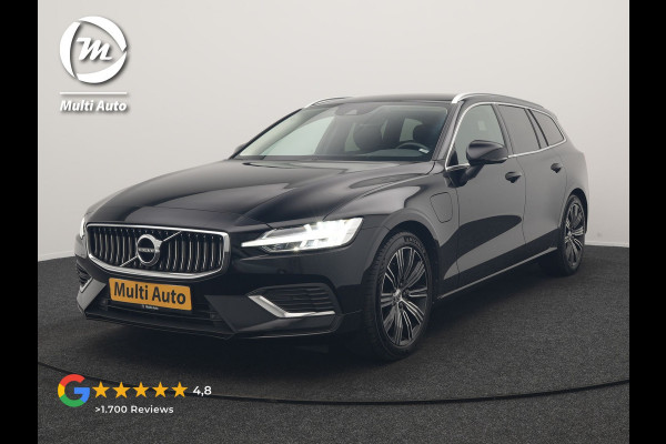 Volvo V60 T6 Recharge AWD Inscription PHEV 340pk Dealer O.H | Trekhaak Af Fabriek | Camera | Harman / Kardon | Lederen Sportstoelen Verwarmd | Cruise Control | Apple Carplay | Stuurverwarming | Keyless | Virtual | Navigatie | DAB | 18"L.M |