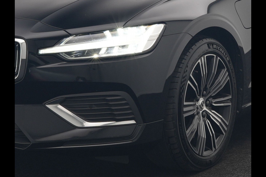 Volvo V60 T6 Recharge AWD Inscription PHEV 340pk Dealer O.H | Trekhaak Af Fabriek | Camera | Harman / Kardon | Lederen Sportstoelen Verwarmd | Cruise Control | Apple Carplay | Stuurverwarming | Keyless | Virtual | Navigatie | DAB | 18"L.M |