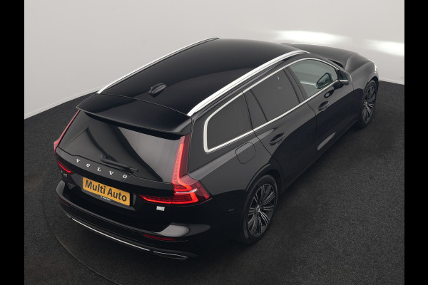 Volvo V60 T6 Recharge AWD Inscription PHEV 340pk Dealer O.H | Trekhaak Af Fabriek | Camera | Harman / Kardon | Lederen Sportstoelen Verwarmd | Cruise Control | Apple Carplay | Stuurverwarming | Keyless | Virtual | Navigatie | DAB | 18"L.M |