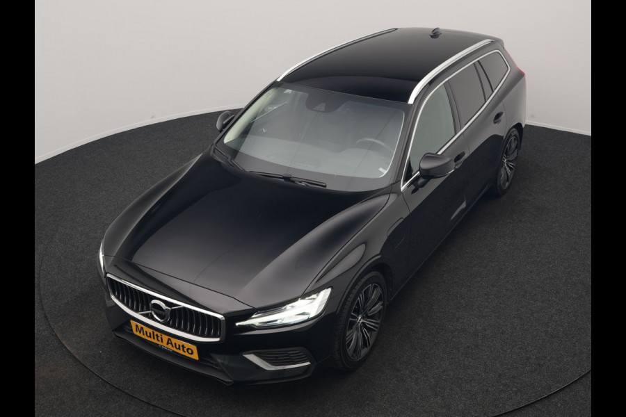 Volvo V60 T6 Recharge AWD Inscription PHEV 340pk Dealer O.H | Trekhaak Af Fabriek | Camera | Harman / Kardon | Lederen Sportstoelen Verwarmd | Cruise Control | Apple Carplay | Stuurverwarming | Keyless | Virtual | Navigatie | DAB | 18"L.M |