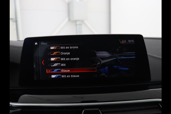 BMW 5 Serie Touring 520i High Executive | Panoramadak | Trekhaak | Head-Up | Stoelventilatie | Stoel & Stuurverwarming | Adaptive cruise | Navigatie | DAB+ | Carplay | Sfeerverlichting | Park assist | Climate control