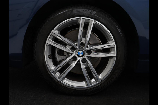 BMW 1-serie 116i Business Edition | Trekhaak | Cruise control | DAB+ | Bluetooth | Carplay | Climate control | Parkeerhulp | Virtual cockpit