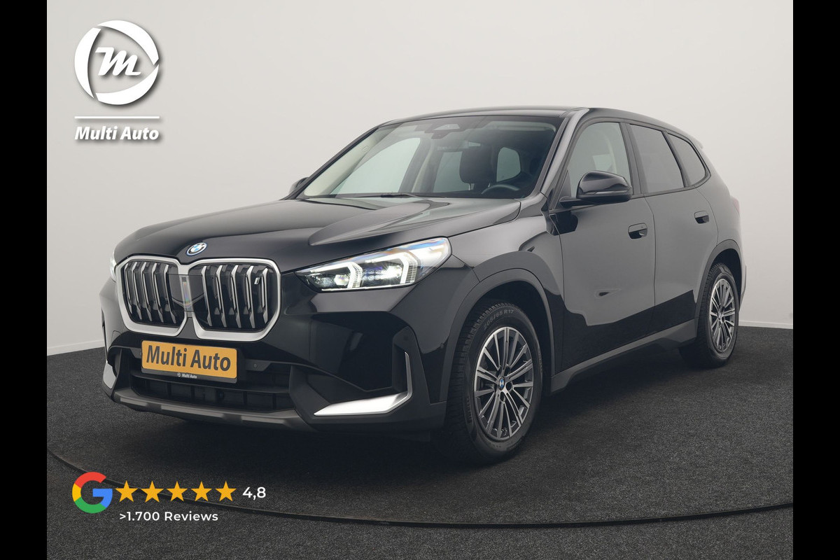 BMW iX1 xDrive30 67 kWh 313pk Dealer O.H. | Trekhaak Af Fabriek | Camera | Adaptief M Onderstel | Voorstoelen Verwarmd | Keyless | Sfeerverlichting | Apple Carplay | Adaptive LED | Cruise Control | Navigatie | DAB |