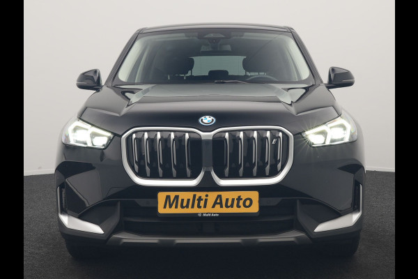 BMW iX1 xDrive30 67 kWh 313pk Dealer O.H. | Trekhaak Af Fabriek | Camera | Adaptief M Onderstel | Voorstoelen Verwarmd | Keyless | Sfeerverlichting | Apple Carplay | Adaptive LED | Cruise Control | Navigatie | DAB |