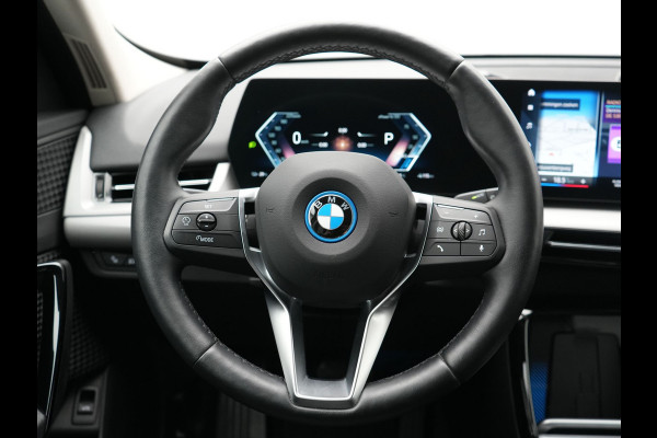 BMW iX1 xDrive30 67 kWh 313pk Dealer O.H. | Trekhaak Af Fabriek | Camera | Adaptief M Onderstel | Voorstoelen Verwarmd | Keyless | Sfeerverlichting | Apple Carplay | Adaptive LED | Cruise Control | Navigatie | DAB |
