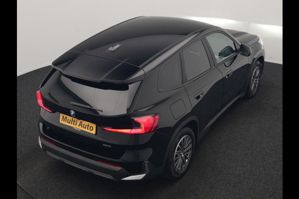 BMW iX1 xDrive30 67 kWh 313pk Dealer O.H. | Trekhaak Af Fabriek | Camera | Adaptief M Onderstel | Voorstoelen Verwarmd | Keyless | Sfeerverlichting | Apple Carplay | Adaptive LED | Cruise Control | Navigatie | DAB |