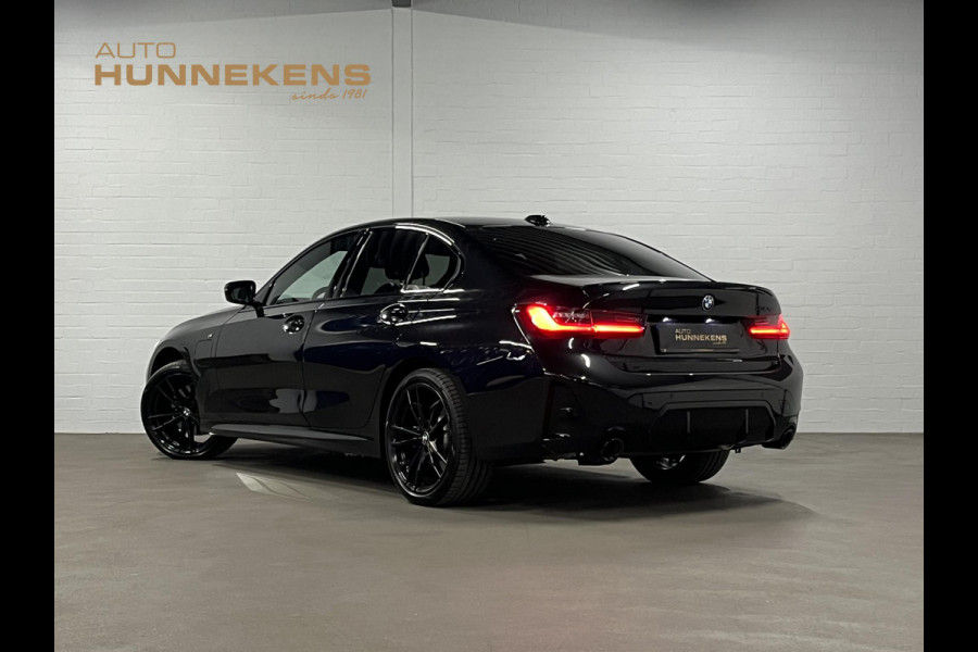 BMW 3-serie 330e M Sport | Open dak | Adapt. cruise | Trekhaak | Head-up | Stoelverwarming | Sfeerverlichting | Carplay | Leder