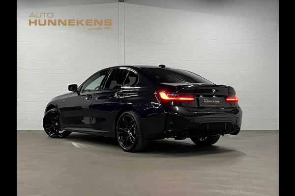 BMW 3-serie 330e M Sport | Open dak | Adapt. cruise | Trekhaak | Head-up | Stoelverwarming | Sfeerverlichting | Carplay | Leder