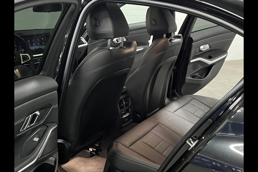 BMW 3-serie 330e M Sport | Open dak | Adapt. cruise | Trekhaak | Head-up | Stoelverwarming | Sfeerverlichting | Carplay | Leder