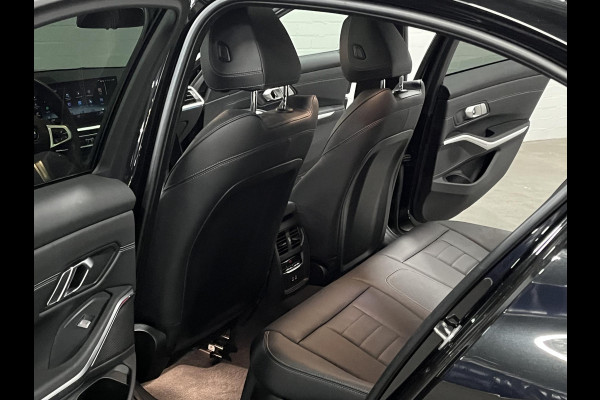 BMW 3-serie 330e M Sport | Open dak | Adapt. cruise | Trekhaak | Head-up | Stoelverwarming | Sfeerverlichting | Carplay | Leder