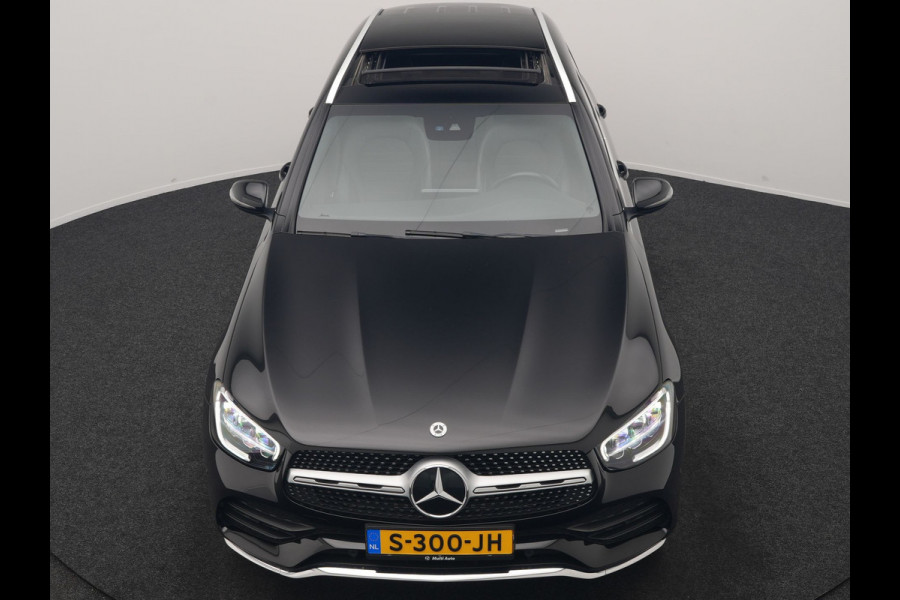 Mercedes-Benz GLC 300e 4MATIC Business Solution AMG 320pk Dealer O.H. | Trekhaak Afn. | Panodak | Camera | Alcantara Sportstoelen Verwarmd | Sfeerverlichting | Apple Carplay | Cruise Control | Navigatie | DAB | 19"L.M | Plug In Hybrid |