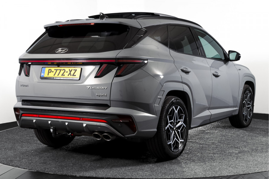 Hyundai Tucson 1.6 T-GDI HEV N Line Sky Orig. NL | S/K-Panodak | Adapt. Cruise | Stoel-+Stuurverw. | PDC | 360 Camera | NAV+App. Connect | ECC | Afn. Trekhaak | LM 19" |