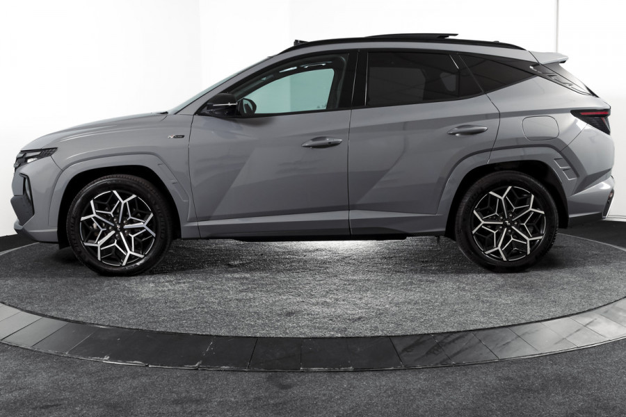 Hyundai Tucson 1.6 T-GDI HEV N Line Sky Orig. NL | S/K-Panodak | Adapt. Cruise | Stoel-+Stuurverw. | PDC | 360 Camera | NAV+App. Connect | ECC | Afn. Trekhaak | LM 19" |