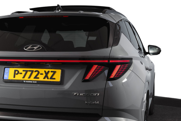 Hyundai Tucson 1.6 T-GDI HEV N Line Sky Orig. NL | S/K-Panodak | Adapt. Cruise | Stoel-+Stuurverw. | PDC | 360 Camera | NAV+App. Connect | ECC | Afn. Trekhaak | LM 19" |