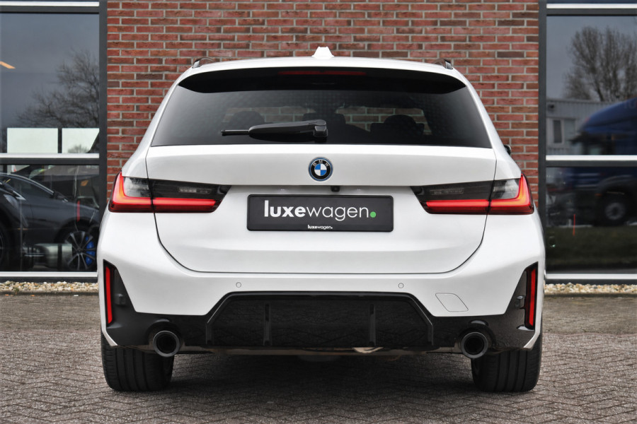 BMW 3 Serie Touring 320e xDrive M-Sport Pro Pano ACC Trekh El-zetels H/K 19inch