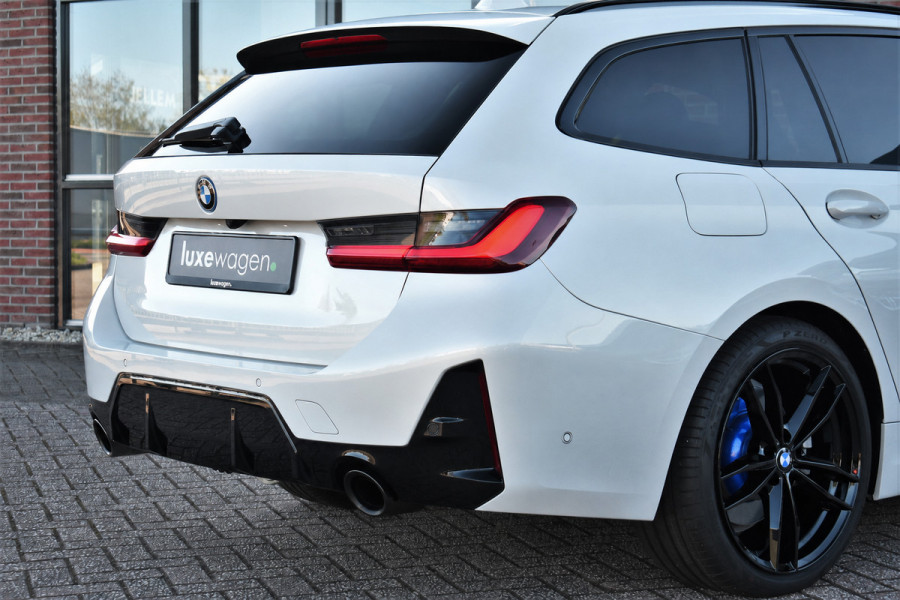 BMW 3 Serie Touring 320e xDrive M-Sport Pro Pano ACC Trekh El-zetels H/K 19inch