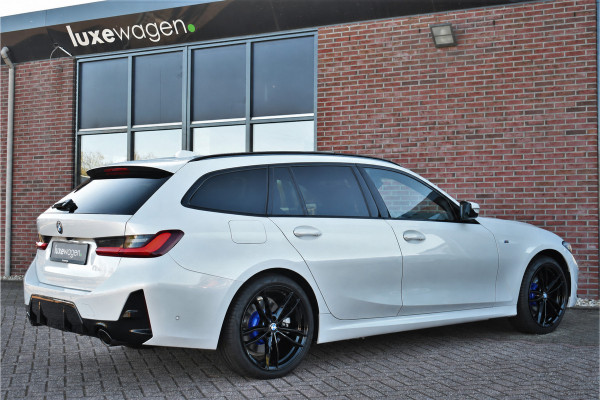 BMW 3 Serie Touring 320e xDrive M-Sport Pro Pano ACC Trekh El-zetels H/K 19inch