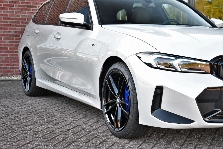 BMW 3 Serie Touring 320e xDrive M-Sport Pro Pano ACC Trekh El-zetels H/K 19inch