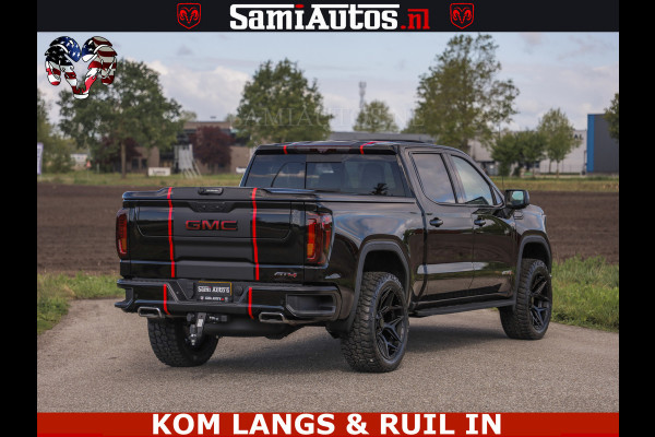 GMC Sierra AT4 6.2 V8 4X4 | VIRTUAL COCKPIT | LPG | HUD | BOM VOL | DC | RAM DEALER NEDERLAND | Dubbele Cabine met Royale 5 Zitplaatsen | BPM vrij | Nu Leverbaar uit Voorraad | Voorraad Nr 261530 | | De specialist in Amerikaanse pick‑ups in Nederland en Europa.