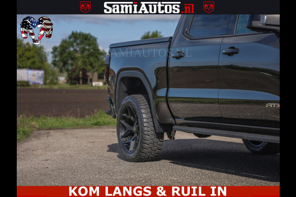 GMC Sierra AT4 6.2 V8 4X4 | VIRTUAL COCKPIT | LPG | HUD | BOM VOL | DC | RAM DEALER NEDERLAND | Dubbele Cabine met Royale 5 Zitplaatsen | BPM vrij | Nu Leverbaar uit Voorraad | Voorraad Nr 261530 | | De specialist in Amerikaanse pick‑ups in Nederland en Europa.