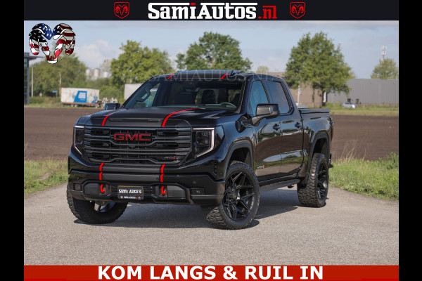 GMC Sierra AT4 6.2 V8 4X4 | VIRTUAL COCKPIT | LPG | HUD | BOM VOL | DC | RAM DEALER NEDERLAND | Dubbele Cabine met Royale 5 Zitplaatsen | BPM vrij | Nu Leverbaar uit Voorraad | Voorraad Nr 261530 | | De specialist in Amerikaanse pick‑ups in Nederland en Europa.