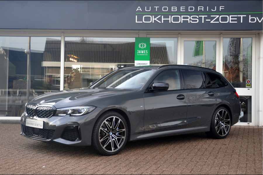 BMW 3 Serie Touring M340i xDrive | Dravit Grau | Panoramadak | Laser | Premium Selection garantie t/m 09/2027