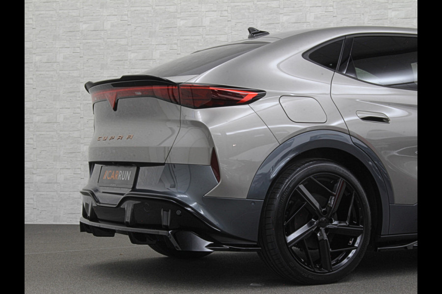 CUPRA Tavascan 77 kWh Aero-pack | Nieuw! | Winter-Pack | Warmtepomp | Verlengde Fabrieksgarantie | 7x Op Voorraad | Adaptive Cruise Control | 3-Zone Clima | Verwarmde Voorruit | Keyless-Entry | Sfeerverlichting | Stoelverwarming | Carplay | Stuurverwarming | Getint Glas | 19 inch | Lane-Assist | Camera | Draadloos Laden |