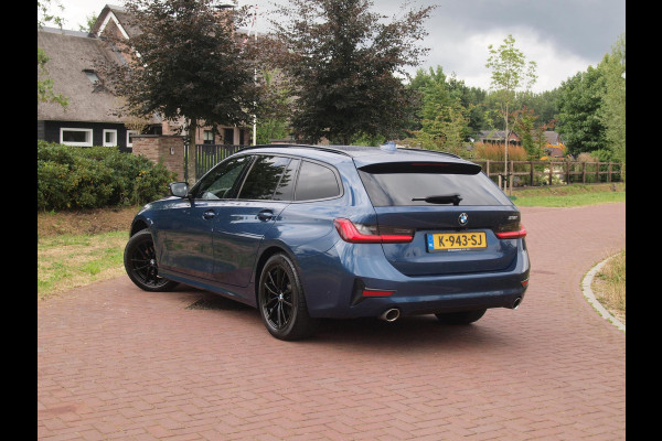 BMW 3 Serie Touring 318i High Executive | Camera | Sfeerverlichting | Apple Carplay | LED-Laser | NL-Auto |
