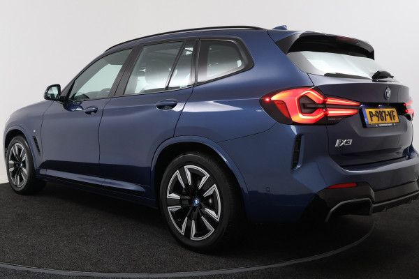 BMW iX3 Executive 80 kWh (PANORAMADAK, CAMERA, SFEERVERLICHTING, STOELVERWARMING, ELEKTR STOELEN, CRUISE ADAPTIEF)