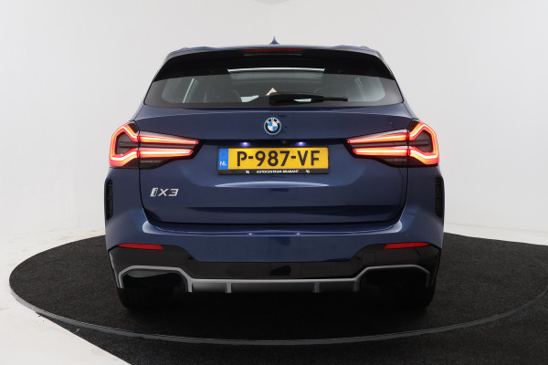 BMW iX3 Executive 80 kWh (PANORAMADAK, CAMERA, SFEERVERLICHTING, STOELVERWARMING, ELEKTR STOELEN, CRUISE ADAPTIEF)