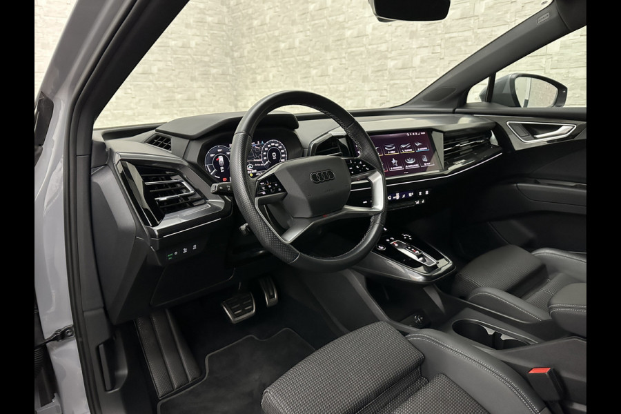 Audi Q4 Sportback e-tron 40 S-Line 77 kWh | Sportstoelen | SOH 98,5 % | H-Leder | ACC | Lane ass. | Virtual + | Black-Optic | Stoelverwarming | 5x Q4 OP VOORRAAD! | Camera | Matrix-Led | Getint Glas | Zwarte Hemelbekleding | MMi+ | 3-Zone Clima | Bovag Garantie |