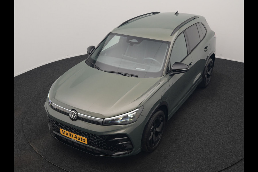 Volkswagen Tiguan 1.5 eHybrid R-Line Edition PHEV 204pk Dealer O.H. | Adaptive Cruise | Head Up | Camera | IQ Light | Sportstoelen Massage & Verwarmd | Sfeerverlichting | Stuur Verwarmd | Keyless | Blis | Apple Carplay | Navigatie | DAB | Plug In Hybrid |