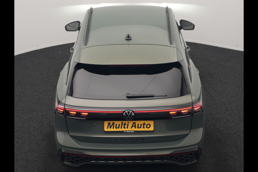 Volkswagen Tiguan 1.5 eHybrid R-Line Edition PHEV 204pk Dealer O.H. | Adaptive Cruise | Head Up | Camera | IQ Light | Sportstoelen Massage & Verwarmd | Sfeerverlichting | Stuur Verwarmd | Keyless | Blis | Apple Carplay | Navigatie | DAB | Plug In Hybrid |