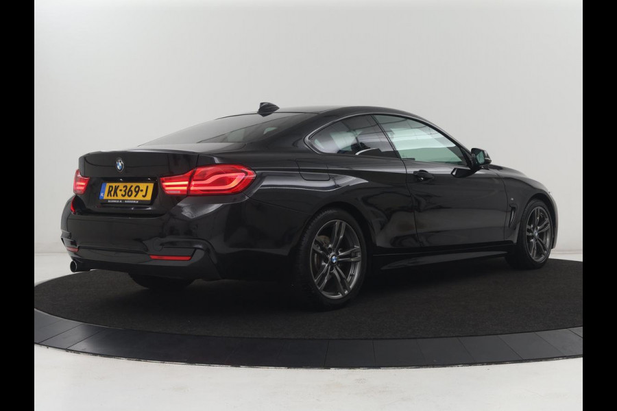 BMW 4 Serie Coupé 418i High Executive M-sport | Stoelverwarming | Leder | Cruise control | Park assist | Sfeerverlichting | Climate control | Navigatie |