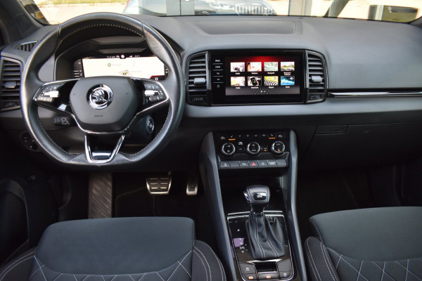 Škoda Karoq 1.5 TSI ACT Sportline | TREKHAAK | STEEL GREY | ADAPTIEVE CRUISE CONTROLE | CAMERA | NAP | STOELVERWARMING | CANTON
