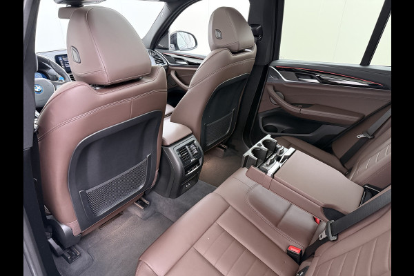 BMW iX3 High Executive 80kWh SOH 96% Panoramadak Sportstoelen Adap.Cruise Harman&Kardon® 360°Camera Head-Up Display Wireless Appel Carpl Elek.Stoelen Memory Stoelverwarming Elek.Achterklep Lmv 20" Privacy Glas DAB Adap.Led Keyless 1e Eigenaar Dealeronderhouden Origineel Nederlandse BMW