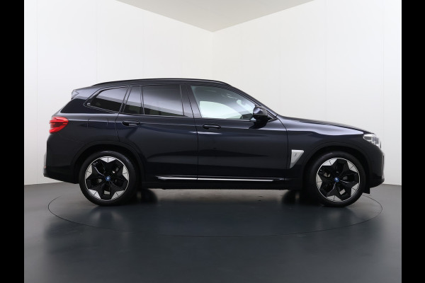 BMW iX3 High Executive 80kWh SOH 96% Panoramadak Sportstoelen Adap.Cruise Harman&Kardon® 360°Camera Head-Up Display Wireless Appel Carpl Elek.Stoelen Memory Stoelverwarming Elek.Achterklep Lmv 20" Privacy Glas DAB Adap.Led Keyless 1e Eigenaar Dealeronderhouden Origineel Nederlandse BMW