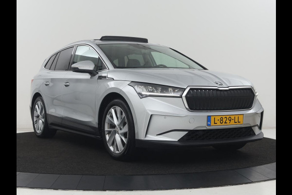 Škoda Enyaq iV 60 | SOH 92,4% | Panoramadak | Stoel/stuur verwarming | Half leder | Adaptive cruise | Carplay | Virtueel dashboard | Sfeerverlichting | Climate control | Camera | Park assist |