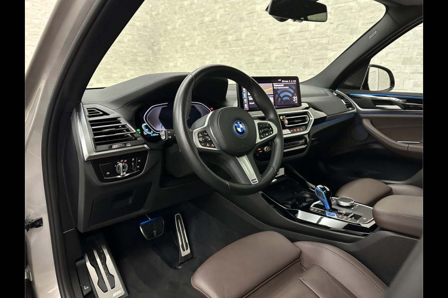 BMW iX3 M-Sport 80 kWh | Panorama | 360 Camera | ACC | Leder | 99% SOH | Head-Up | Keyless-Entry | Harman-Kardon | Memory | Dodehoek | 3-Zone Clima | Sfeerverlichting | Carplay | ISO-Glas | Draadloos Laden | Bovag Garantie |