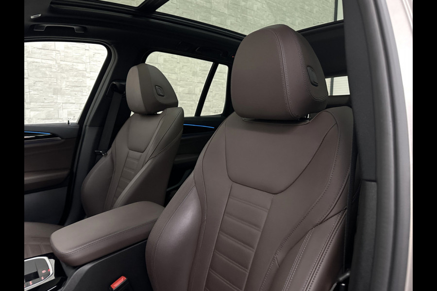 BMW iX3 M-Sport 80 kWh | Panorama | 360 Camera | ACC | Leder | 99% SOH | Head-Up | Keyless-Entry | Harman-Kardon | Memory | Dodehoek | 3-Zone Clima | Sfeerverlichting | Carplay | ISO-Glas | Draadloos Laden | Bovag Garantie |