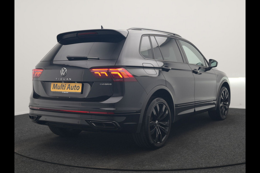 Volkswagen Tiguan 1.4 TSI eHybrid R-Line Business PHEV 245pk | Trekhaak Af Fabriek | Adaptive Cruise | IQ Light | Camera | Lederen Sportstoelen Memory & Verwarmd | Sfeerverlichting | Stuur Verwarmd | Apple Carplay | Navigatie | DAB | 20"L.M | Plug In Hybrid |