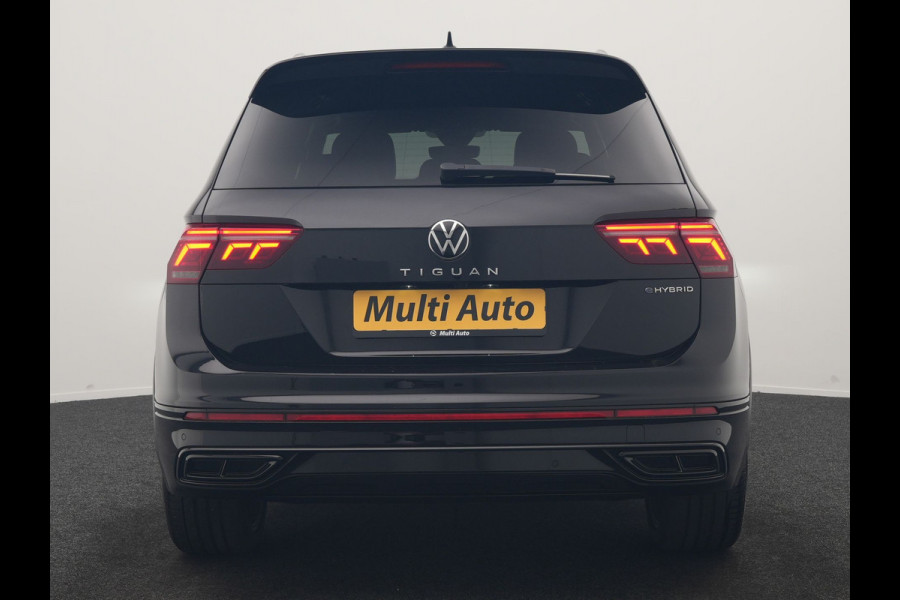 Volkswagen Tiguan 1.4 TSI eHybrid R-Line Business PHEV 245pk | Trekhaak Af Fabriek | Adaptive Cruise | IQ Light | Camera | Lederen Sportstoelen Memory & Verwarmd | Sfeerverlichting | Stuur Verwarmd | Apple Carplay | Navigatie | DAB | 20"L.M | Plug In Hybrid |