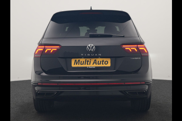 Volkswagen Tiguan 1.4 TSI eHybrid R-Line Business PHEV 245pk | Trekhaak Af Fabriek | Adaptive Cruise | IQ Light | Camera | Lederen Sportstoelen Memory & Verwarmd | Sfeerverlichting | Stuur Verwarmd | Apple Carplay | Navigatie | DAB | 20"L.M | Plug In Hybrid |