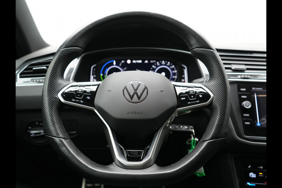Volkswagen Tiguan 1.4 TSI eHybrid R-Line Business PHEV 245pk | Trekhaak Af Fabriek | Adaptive Cruise | IQ Light | Camera | Lederen Sportstoelen Memory & Verwarmd | Sfeerverlichting | Stuur Verwarmd | Apple Carplay | Navigatie | DAB | 20"L.M | Plug In Hybrid |